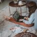 photo of woman typing on laptop